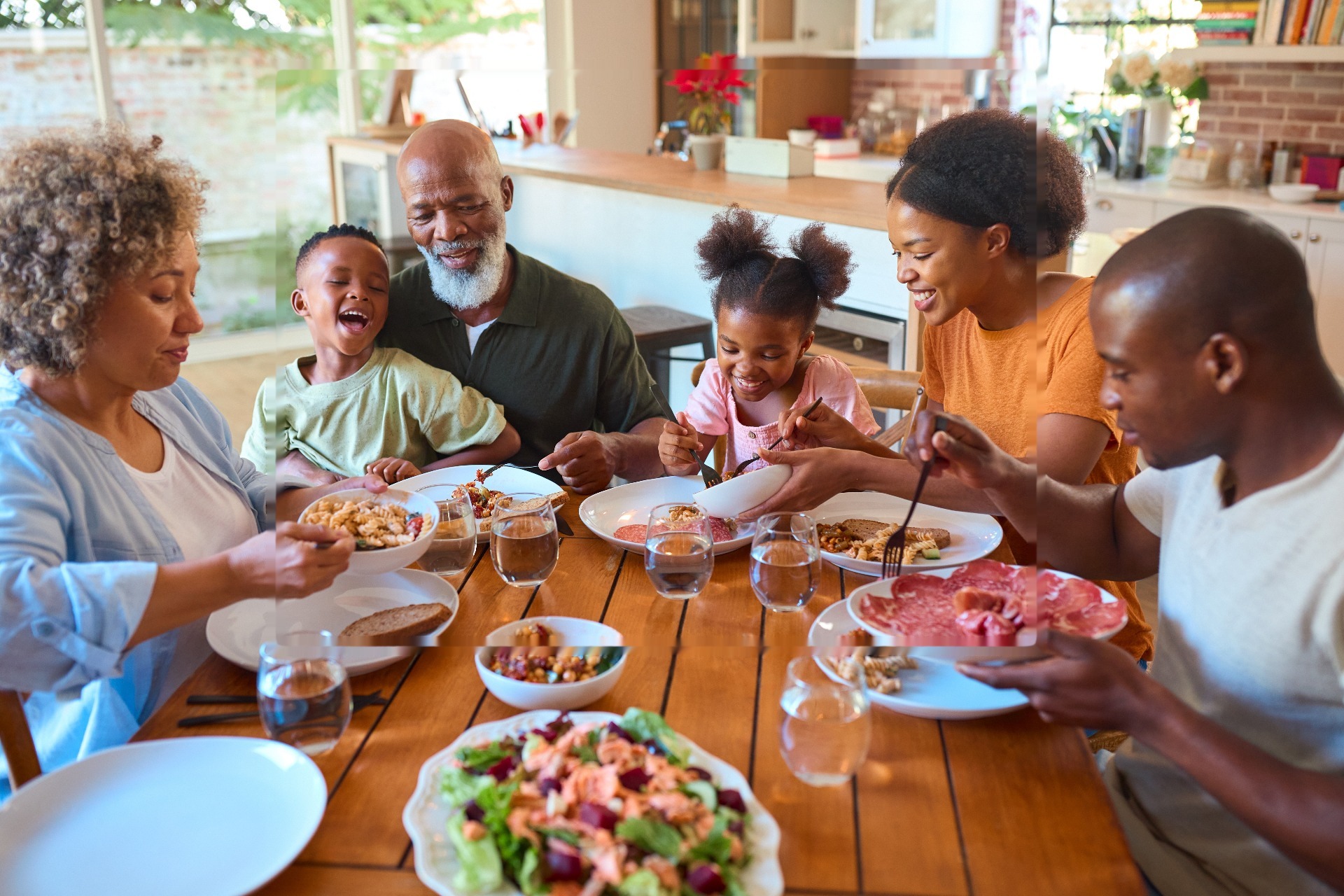 Multi-generation family sharing a meal together